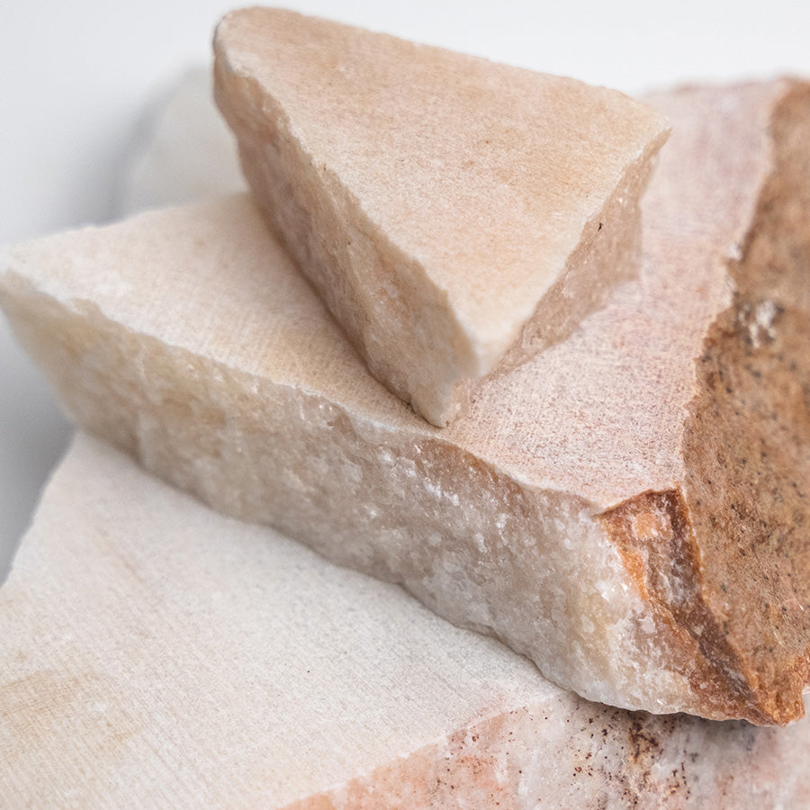 Duo of natural pink marble stones