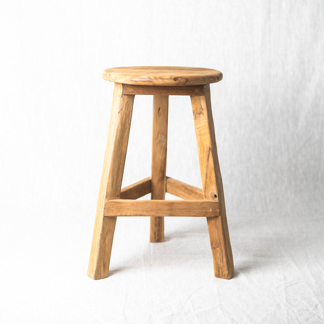 3-legged teak stool